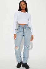 Load image into Gallery viewer, FASHION NOVA PAST AND PRESENT CROSS OVER JEANS IN LIGHT WASH
