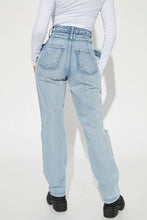 Load image into Gallery viewer, FASHION NOVA PAST AND PRESENT CROSS OVER JEANS IN LIGHT WASH

